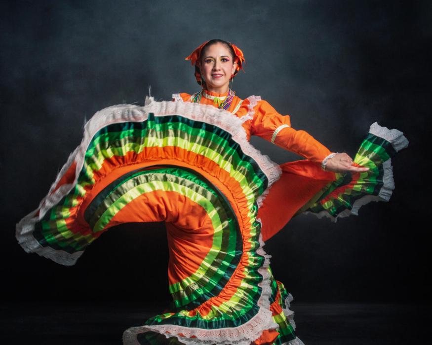 Mexican woman with escaramusa costume jalisco mexico orange color Mexican woman with escaramusa costume jalisco mexico orange color